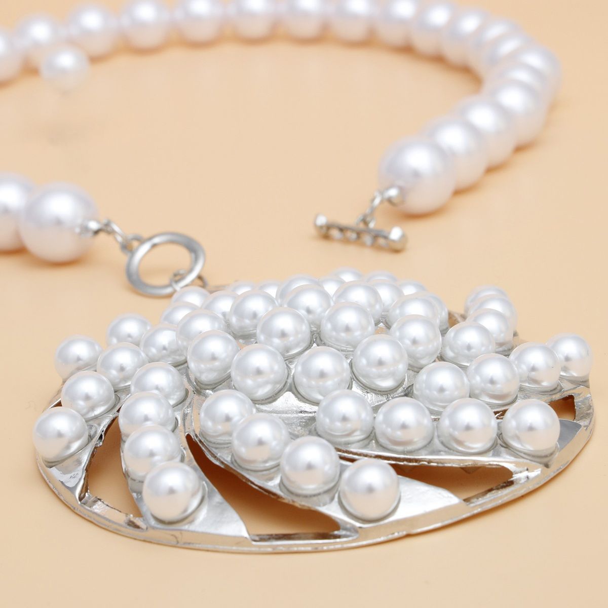 Toggle Silver Swirled Circle Chunky Pearl Necklace